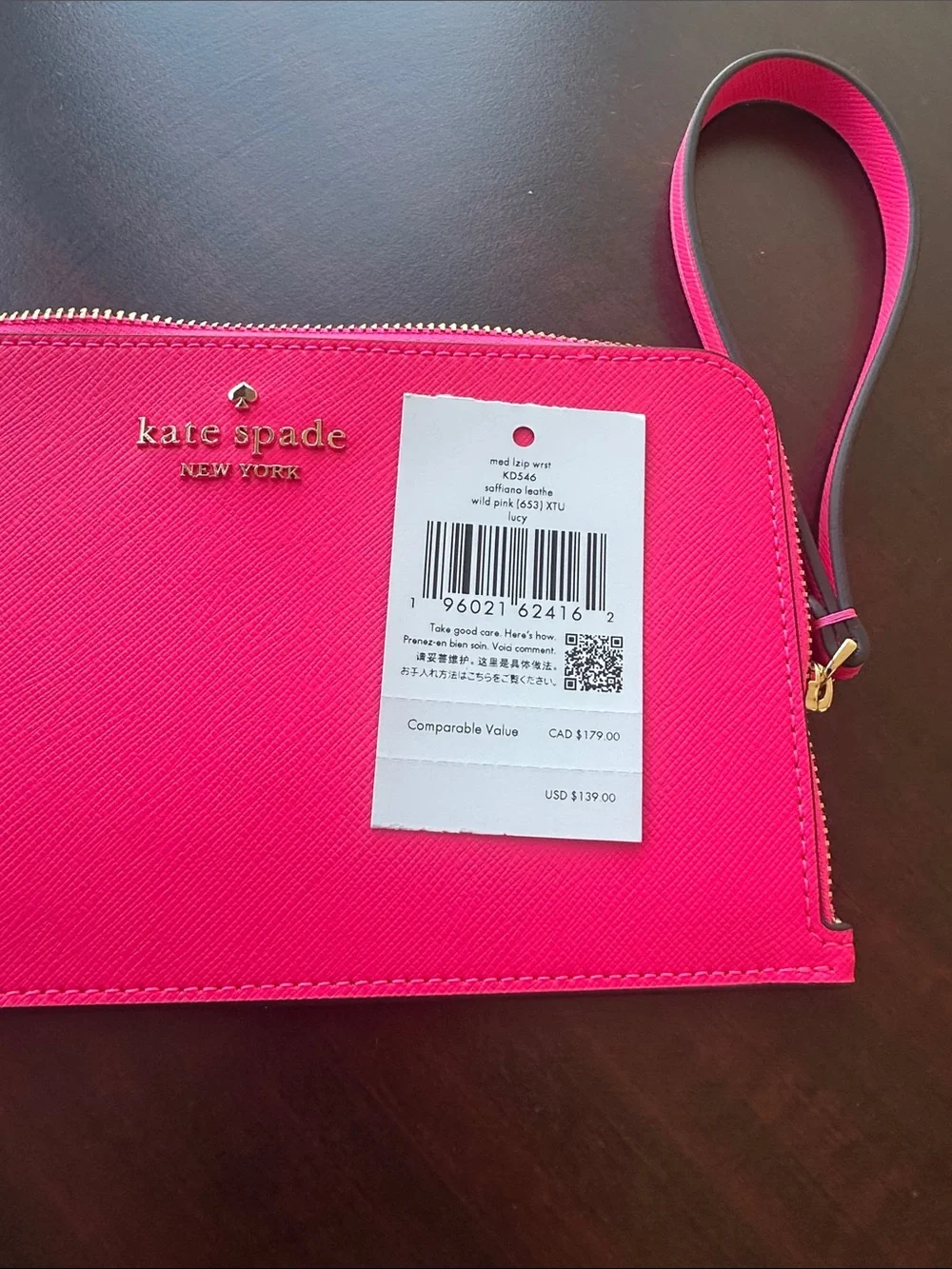 kate spade Bright Pink Zip Wristlet with Gold Logo